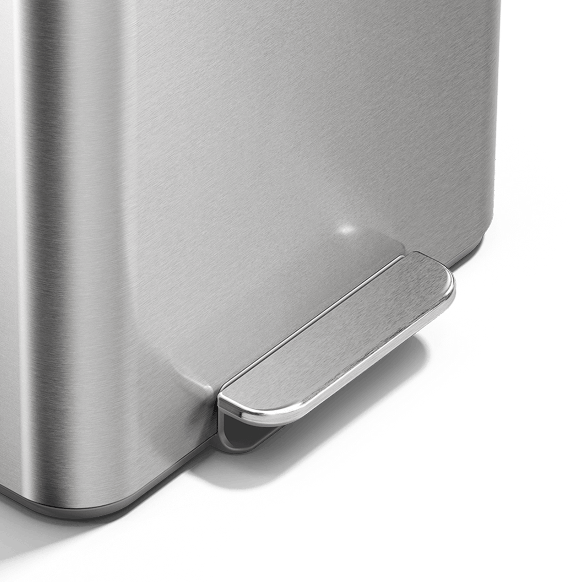 Simplehuman 16L Brushed Stainless Steel Mini Step Can with pedal, close up of pedal.