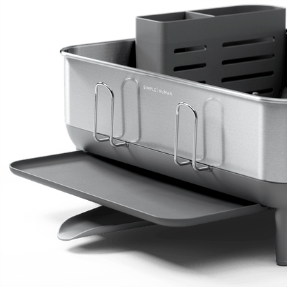 Detail view of Simplehuman Compact Steel Frame Dishrack in Brushed Stainless Steel, showing adjustable drainage and cup racks.