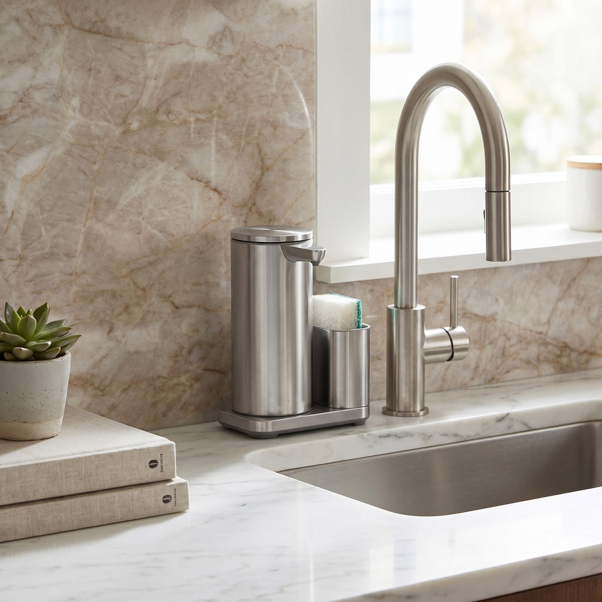 Simplehuman's 9 oz. Liquid Sensor Pump with Caddy in Brushed in a modern kitchen setting with marble backsplash.