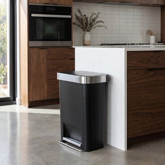 Simplehuman's 45L Hybrid Can in MAtte Black in a modern kitchen setting.